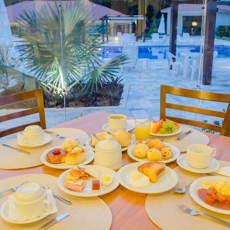 Complexo Eco Cataratas Resort By Sj Foz do Iguacu Exterior photo A breakfast table